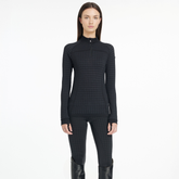 Person wearing a black checkered outfit on a white background